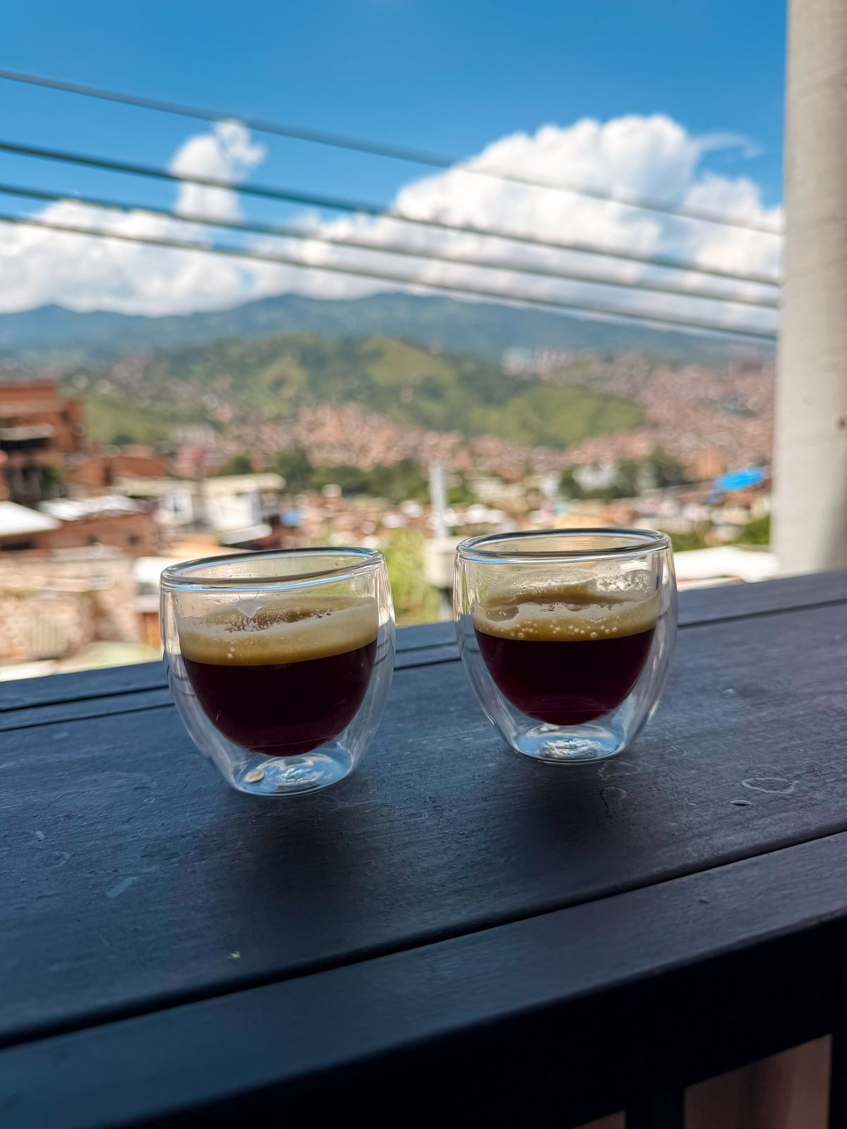 Espresso on a rooftop overlooking the hillside